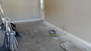 Renovation in progress, exposing concrete floor for potential slab raising