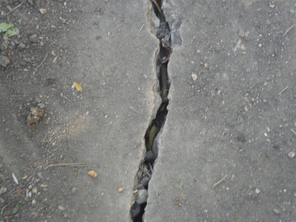 Cracked concrete may indicate the need for slab raising solutions.