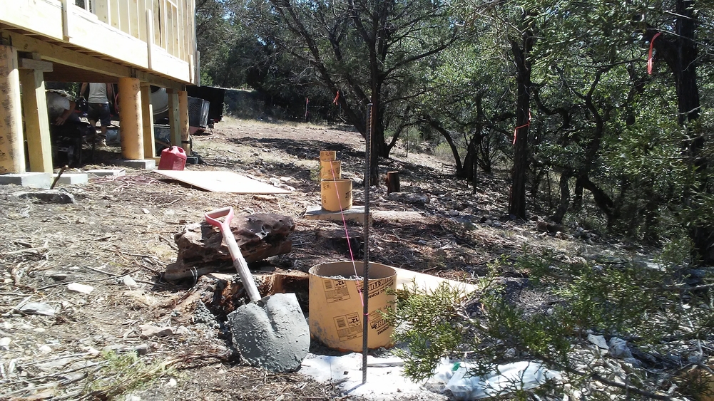 Construction area showing pier foundation repair process